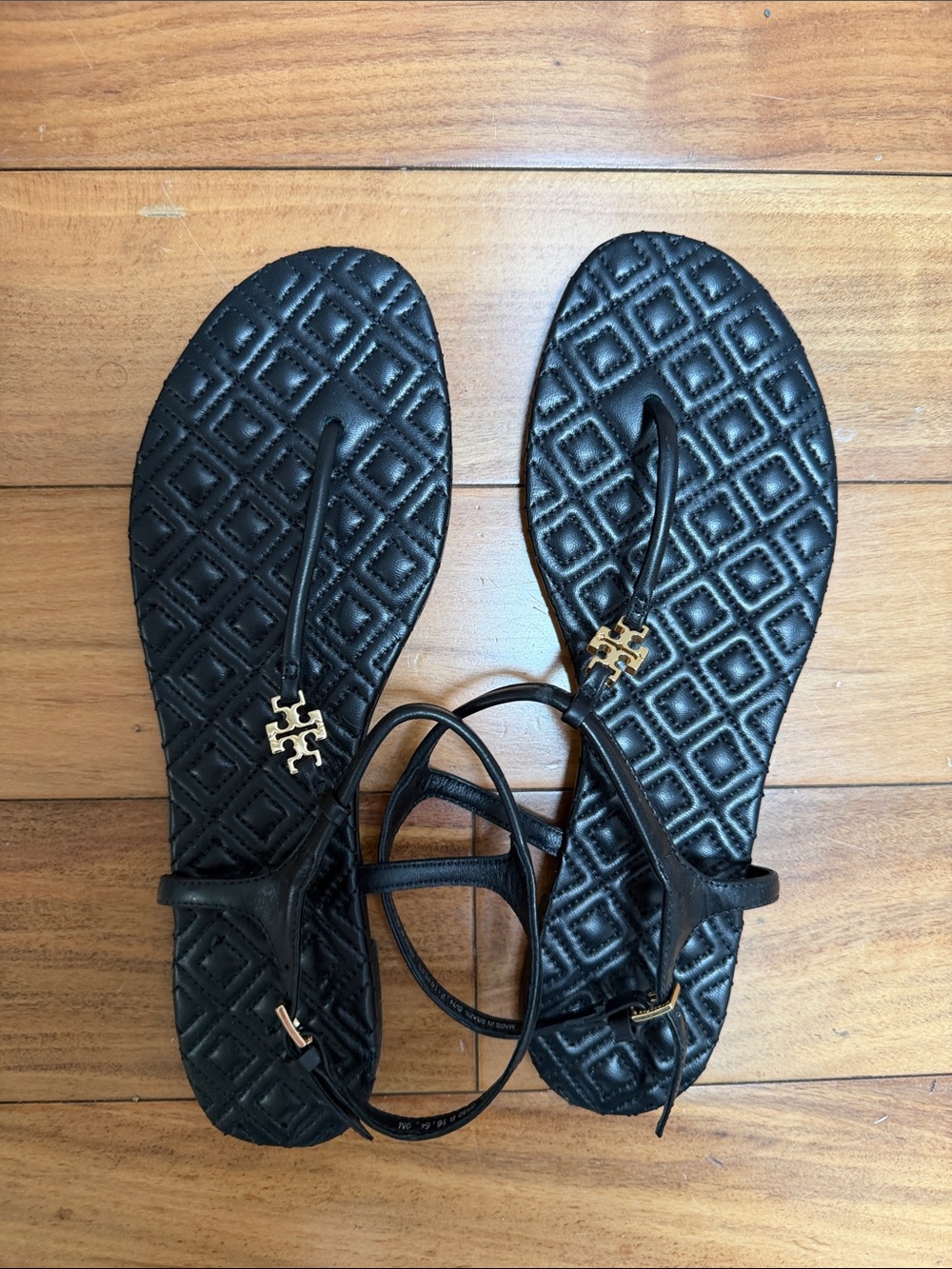 Tory Burch Black Quilted Thong Sandals with Gold Logo
